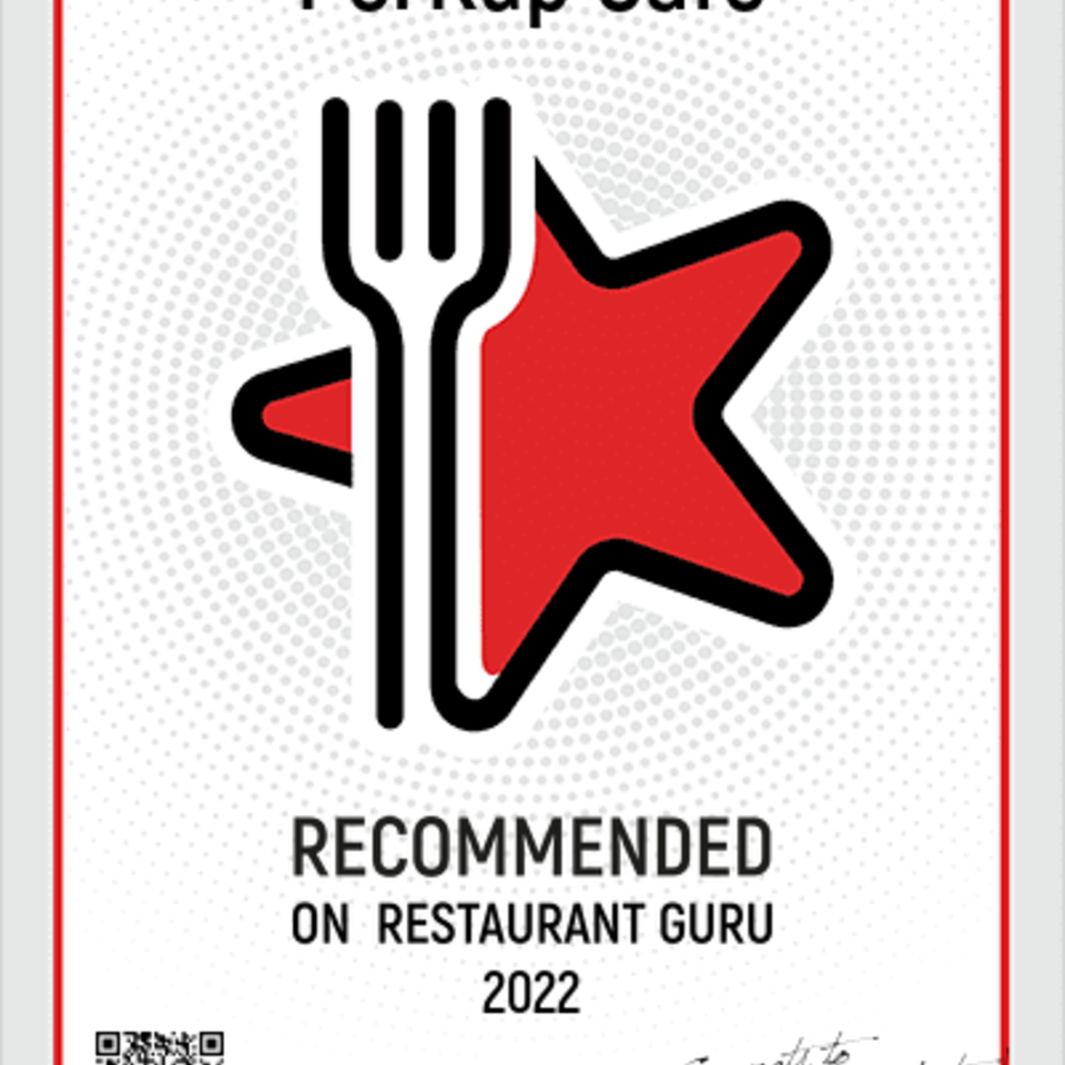 PerKup Cafe's 2022 Restaurant Guru recommendation badge, featuring a fork and red star.