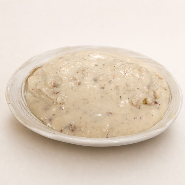 1/2 ORDER BISCUITS AND GRAVY.
